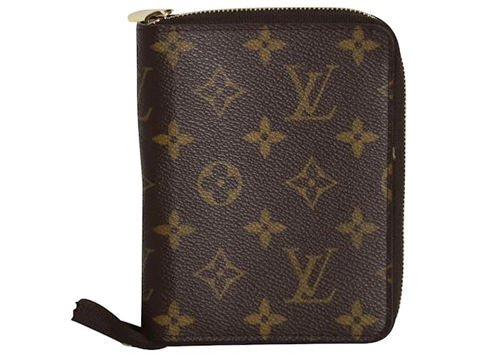 Portafoglio porta passaporto con cerniera Louis Vuitton Monogram in tela rivestita marrone
