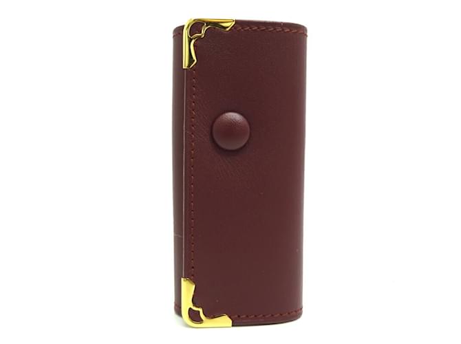 Portachiavi a 4 anelli della linea Must di Cartier in pelle bordeaux Bordò