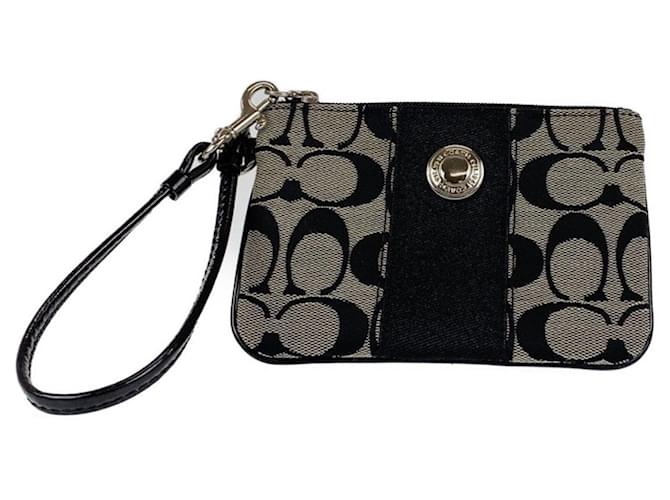 Pochette in tela con firma Coach Nero