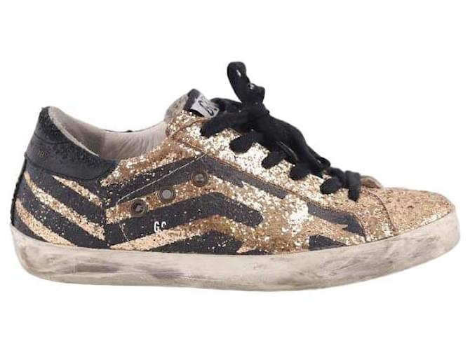 Golden Goose Sneaker Superstar in pelle D'oro