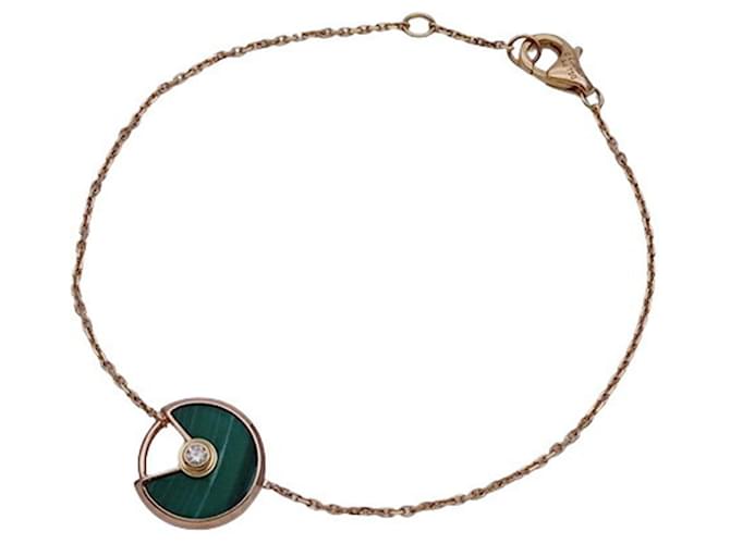 Bracciale charm in oro rosa Cartier con malachite e diamante D'oro