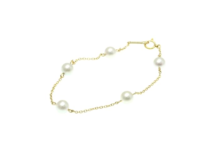 Bracciale charm Tasaki Pearl Station D'oro