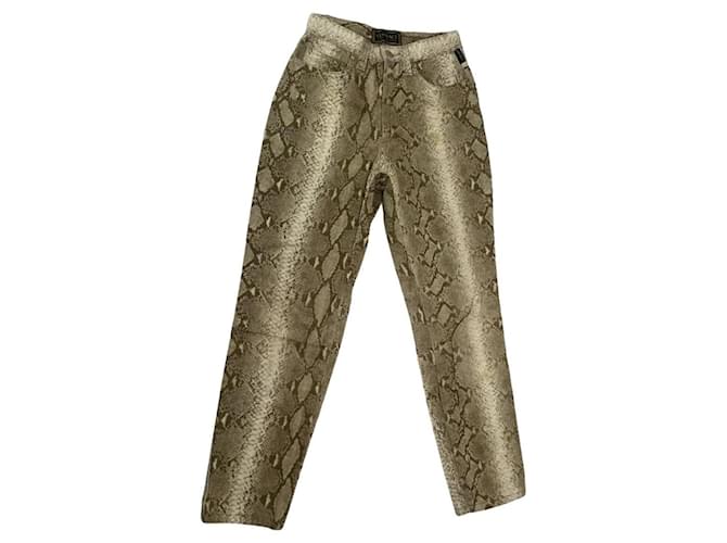Pantaloni in cotone dorato Versace D'oro