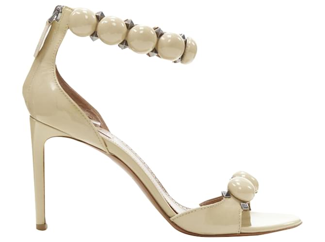 Alaïa Sandalo con tacco alto in vernice nude con borchie decorate Alaia La Bombe Marrone Beige