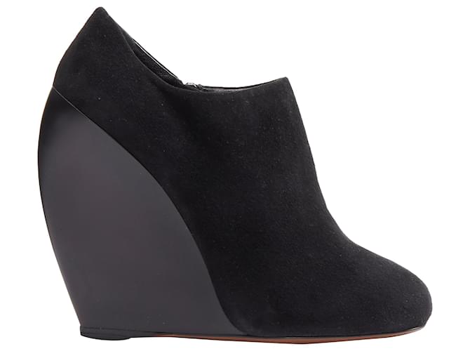 Alaïa Stivaletto in suede con tacco curvo e punta rotonda Azzedine Alaia Nero