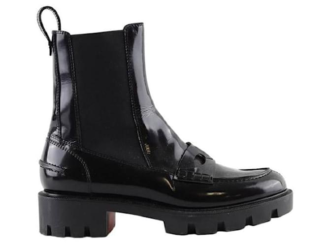 Christian Louboutin Stivali in pelle verniciata Nero