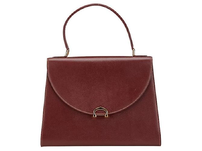 Borsa in pelle della linea Must di Cartier Rosso