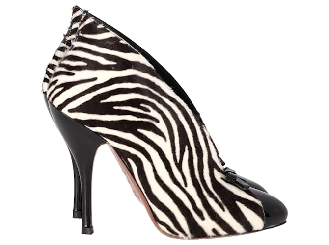 Alaïa Stivaletti con stampa zebra Alaia Azzedine in pelle di vitello nero e bianco in pelo di pony Multicolore