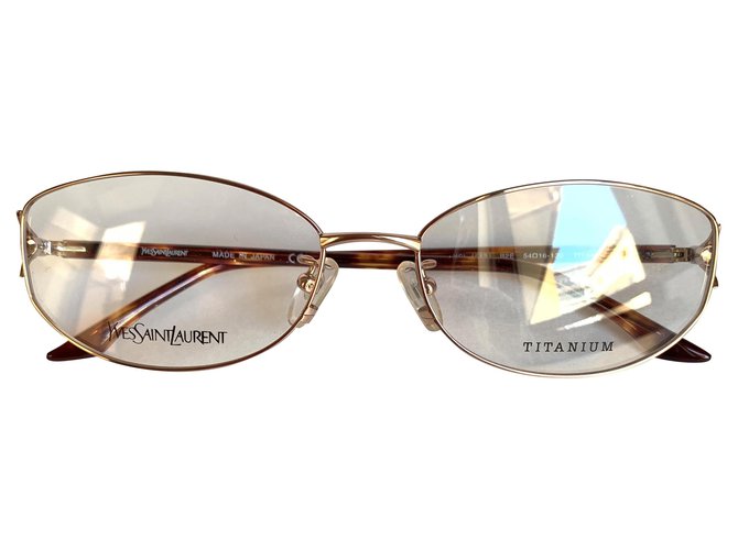 Yves Saint Laurent Montature YSL in titanio Gold hardware