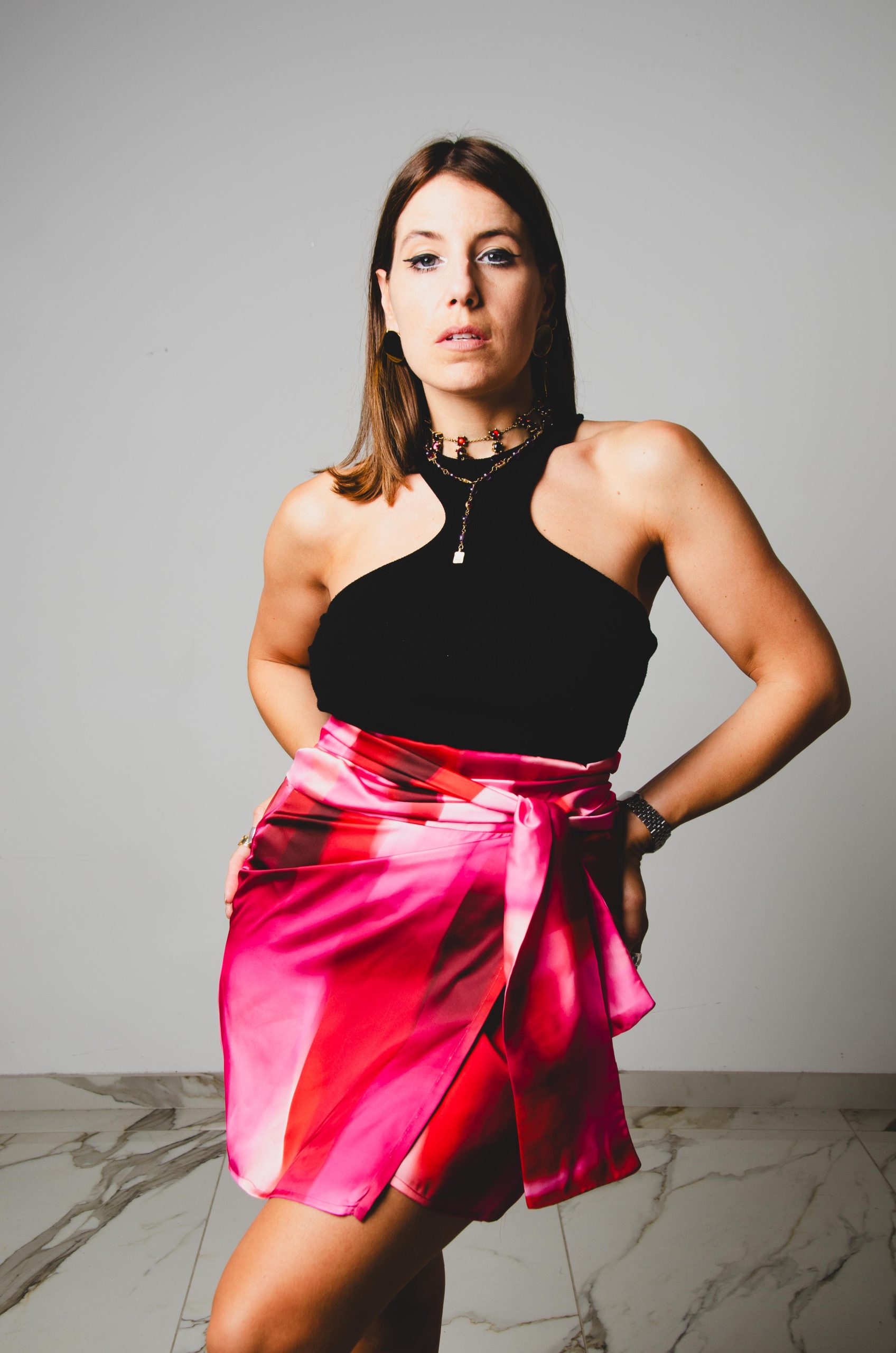 271 Gonna multiposizione mini MIRI in satin sfumato fucsia