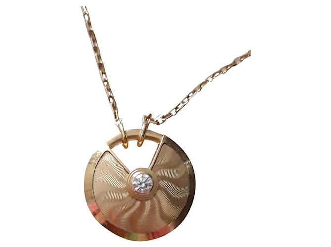 Cartier amuleto guilloché D'oro