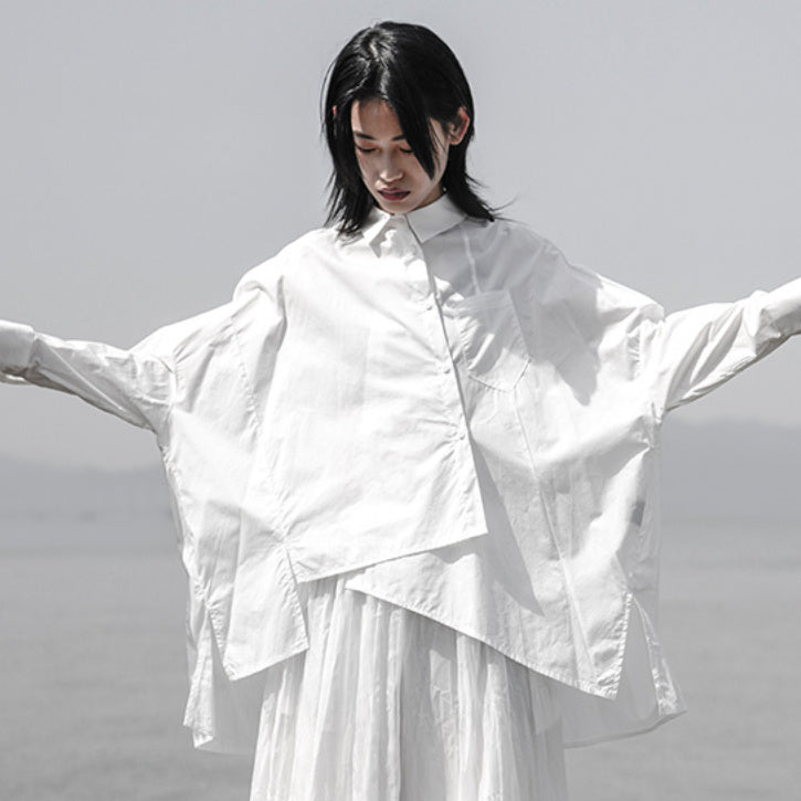Camicia bianca design irregolare asimmetrica da donna