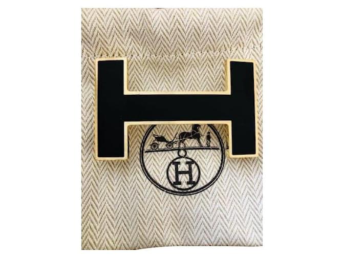 Constance Hermès Quiz nero bordato di ottone dorato