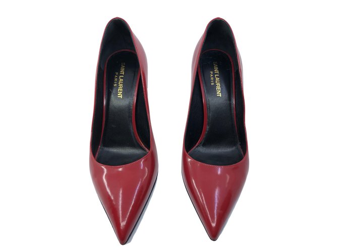Yves Saint Laurent Tacchi Rosso