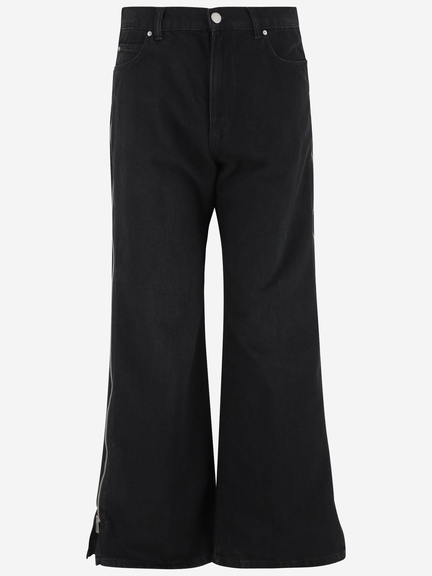 JEANS IN COTONE CON ZIP LATERALI