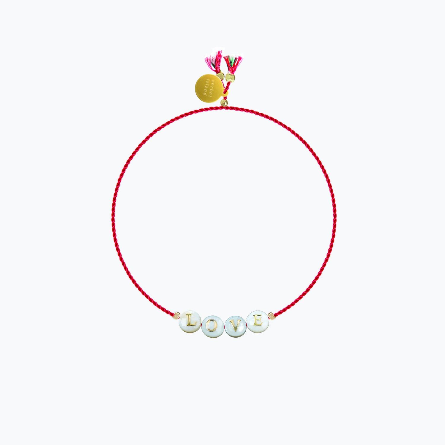 BRACCIALE SHELL CON PERLE IN VETRO